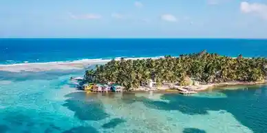 An aerial view of an island in Belize, located in the ocean.