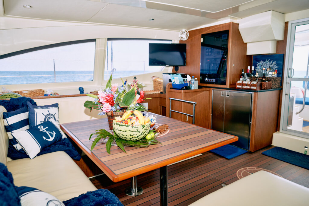 A luxury yacht gallery featuring a table on board.